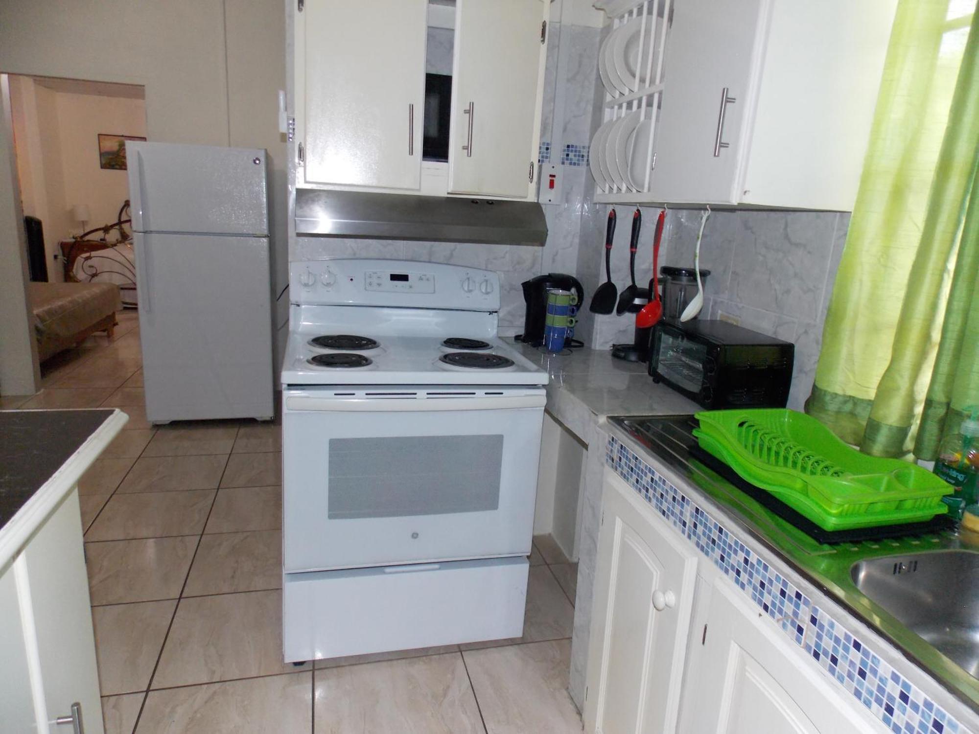 Stewart Apt- Trincity, Airport, Washer, Dryer, Office, Cable , Wifi 部屋 写真